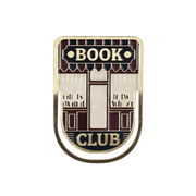 Close up of Book Club enamel metal bookmark with bookshop storefront design
