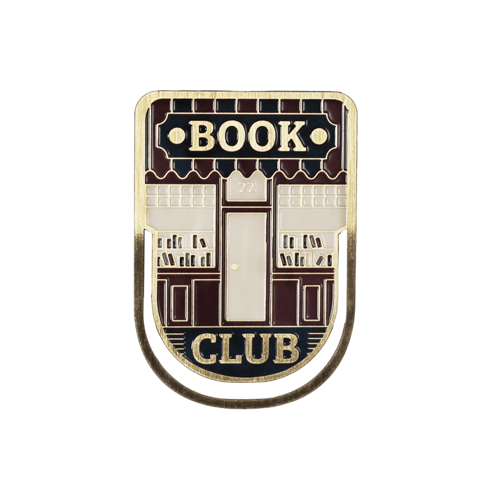 Close up of Book Club enamel metal bookmark with bookshop storefront design
