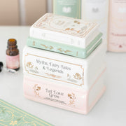 Ceramic book stack oil burner and wax warmer with pastel book design