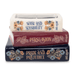 Front view of Jane Austen book stack shaped candle with literary title details
