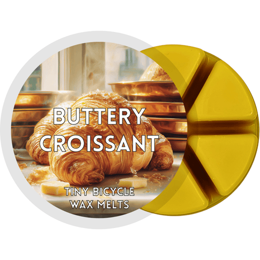 Buttery Croissant wax melt main product image showing label and yellow segmented wax melt on a plain background