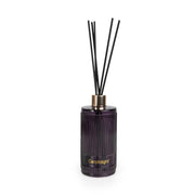 Candlelight Blackberry & Fig Tree 200ml reed diffuser bottle in ribbed purple glass with gold collar and black diffuser reeds, front view.