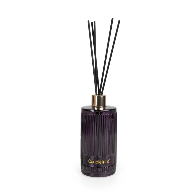 Candlelight Blackberry & Fig Tree 200ml reed diffuser bottle in ribbed purple glass with gold collar and black diffuser reeds, front view.