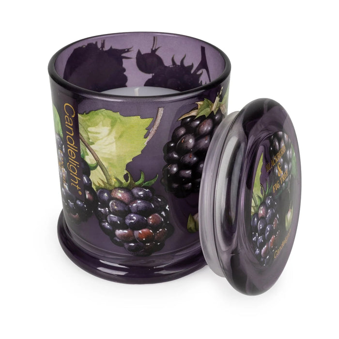 Candlelight Blackberry & Fig Tree jar candle shown open with lid beside, purple glass with blackberry print and white wax.