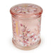 Angled view of Candlelight Cherry Blossom & Sakura large lidded glass jar candle with matching pink lid and blooms.