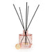 Candlelight Cherry Blossom & Sakura reed diffuser in blush pink glass bottle with black reeds on a white background.