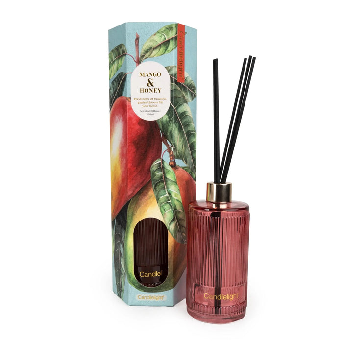 Candlelight Mango & Honey 200ml reed diffuser with ribbed pink glass bottle, black reeds and illustrated mango gift box.