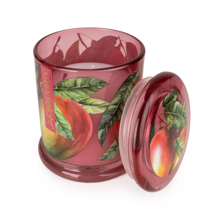 Candlelight Mango & Honey jar candle shown open with lid beside, berry-pink glass with mango print and white wax.