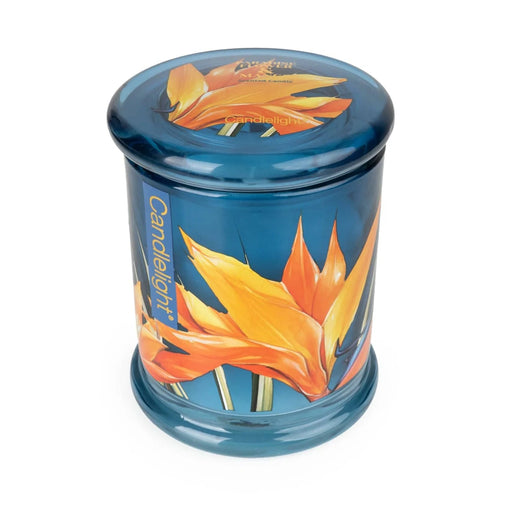 Angled view of Candlelight Paradise Flower & Mango large glass lidded jar candle in blue glass with bold orange paradise flower design.