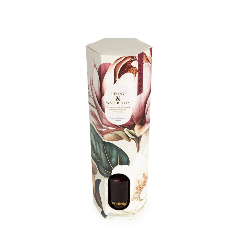 Angled view of Candlelight Peony & Water Lily reed diffuser gift box with botanical design and product window.