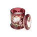 Candlelight Peony & Water Lily jar candle shown open with lid beside, crimson glass floral design and white wax.
