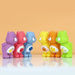 Care Bears mini figures arranged in two rows facing each other, orange background