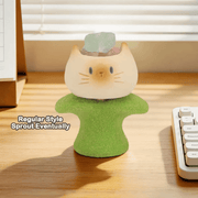 Sprout Eventually Cat PAI blind box figure on a green base beside a keyboard