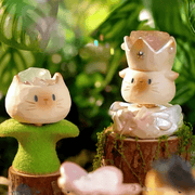 Sprout Eventually and secret Wear the Crown Cat PAI figures displayed together