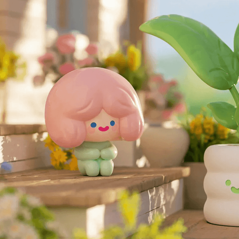 Cell RiCO’s Relax Time tiny green RiCO beside leafy plant pot
