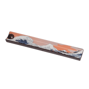 Ceramic Great Wave incense holder with peach sunset wave design