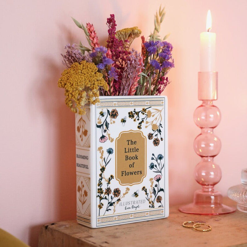 Lisa Angel Little Book of Flowers vase on bedside display with candle holder and jewellery.