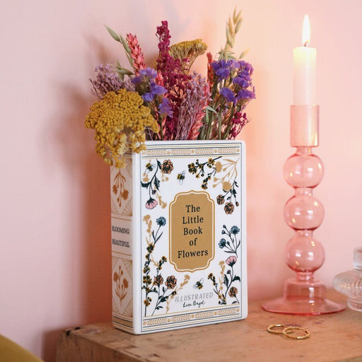 Lisa Angel Little Book of Flowers vase on bedside display with candle holder and jewellery.