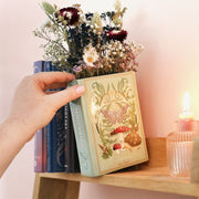 Moonrise Woodland book vase styled with flowers