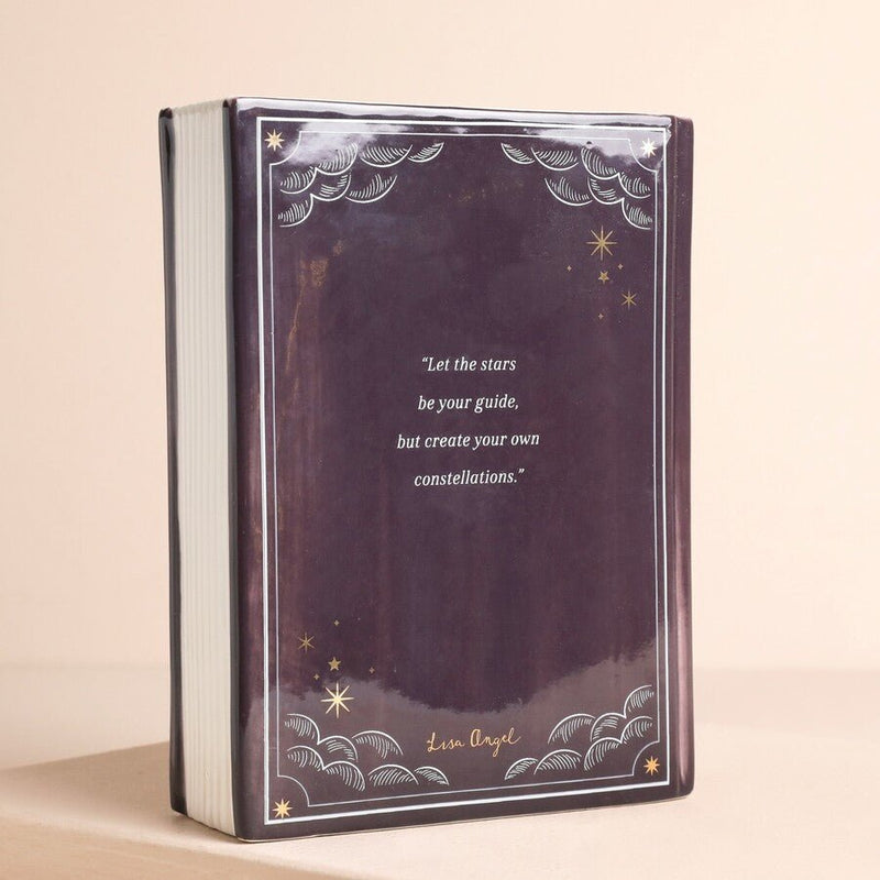 Back of purple celestial book vase with starry design