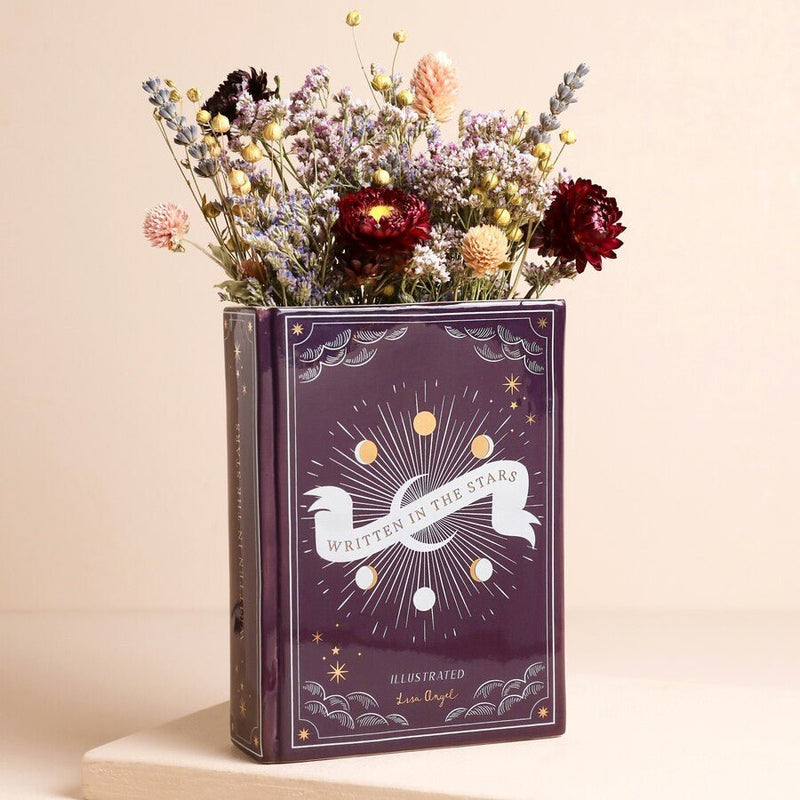 Purple celestial ceramic book vase with moon phase artwork
