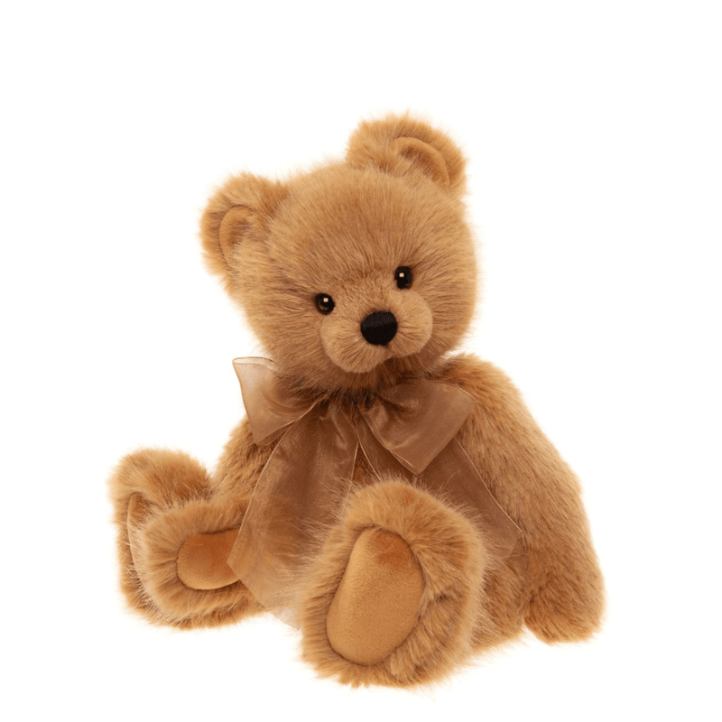Charlie Bears Acer plush teddy bear in honey-toned fur with organza bow, angled sitting pose
