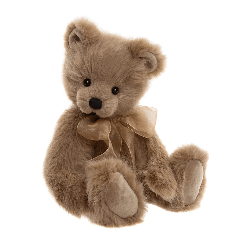 Charlie Bears Beanstalk plush teddy bear in light brown fur with golden organza bow, angled sitting pose