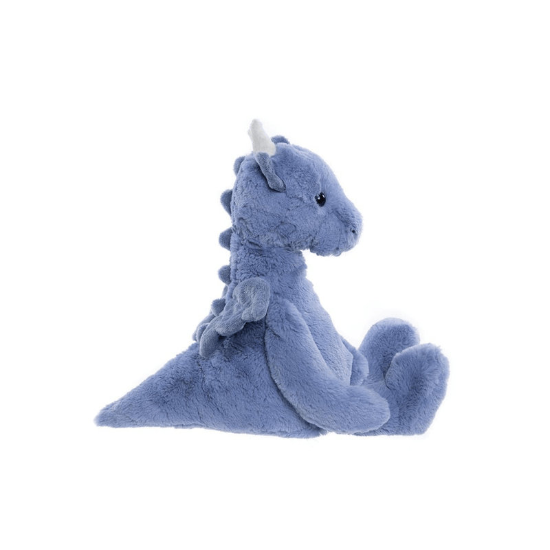 Side profile of Charlie Bears Draco denim blue dragon plush