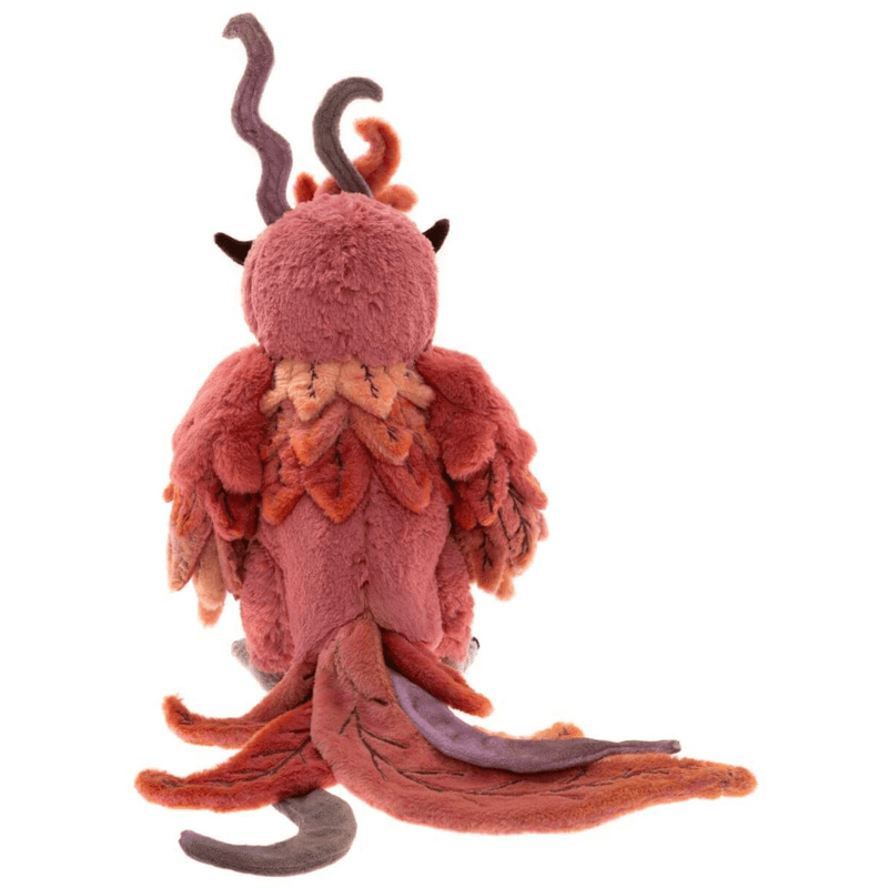 Rear view of Charlie Bears Jinzi phoenix showing her red and coral layered feathers, long tail and curled head plumes