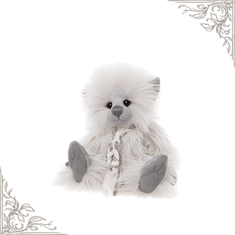 Wind Elf from the Charlie Bears Plush Collection showing her cloud-like white fur, sculpted grey paws and embroidered nose