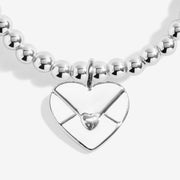 Close-up of Joma Sending Love bracelet heart envelope charm