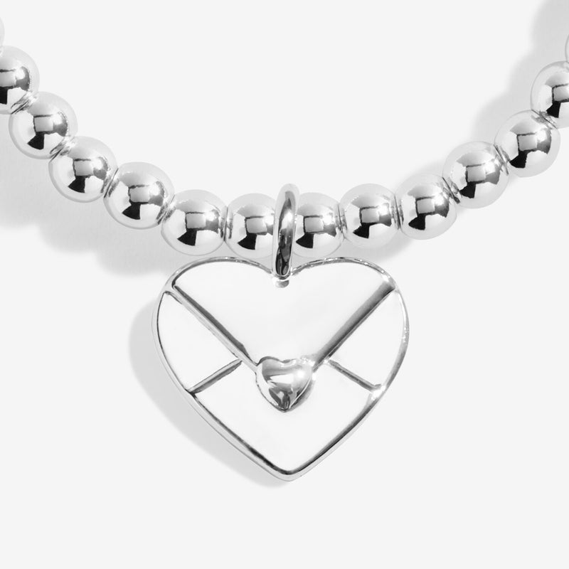 Close-up of Joma Sending Love bracelet heart envelope charm