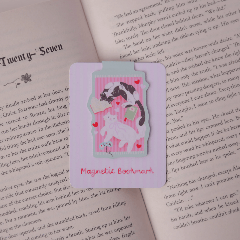 Cosy Cats magnetic bookmark displayed on an open book