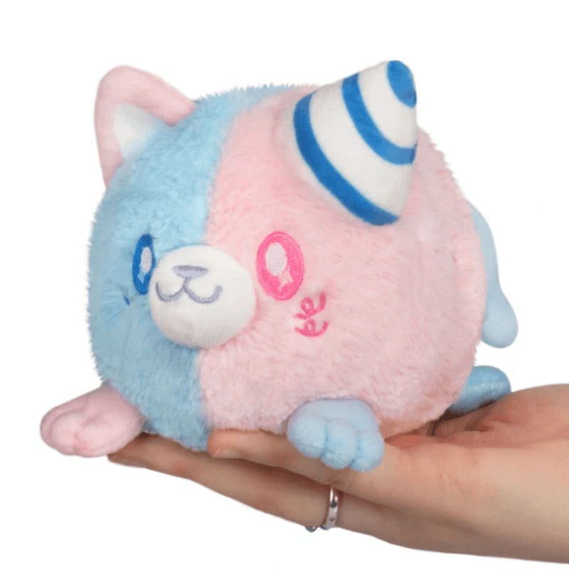 Front view of Squishable Alter Egos Cotton Candy Kitty Plush in pink and blue with striped horn