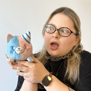 Person holding Squishable Alter Egos Cotton Candy Kitty Plush