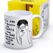 Boxed stoneware mug with Shrigley rant “You are a bunch of twats … doing my head in”, shown beside bright yellow gift box.
