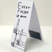 Side view of folded magnetic bookmark with hidden magnet and thumbs-up art reading “Everything is good”.

