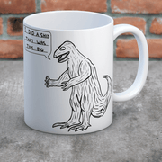 David Shrigley dinosaur mug on table with I did a shit that was this big illustration