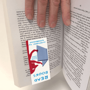 Read Books magnetic bookmark gripping pages as a hand turns the book.









Ask ChatGPT
