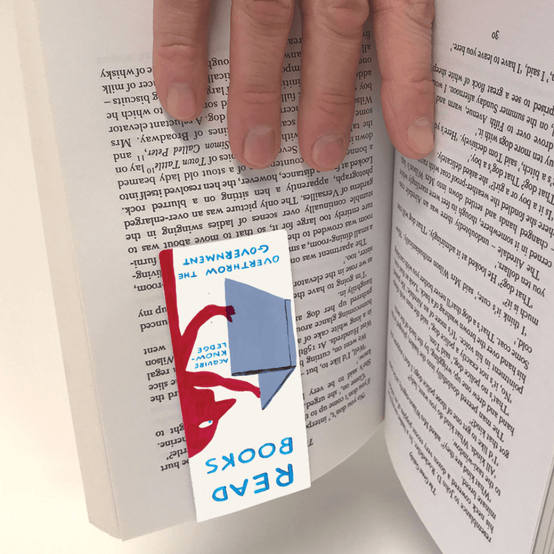 Read Books magnetic bookmark gripping pages as a hand turns the book.









Ask ChatGPT
