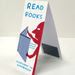 Side view of folded Read Books magnetic bookmark showing hidden magnet panel.
