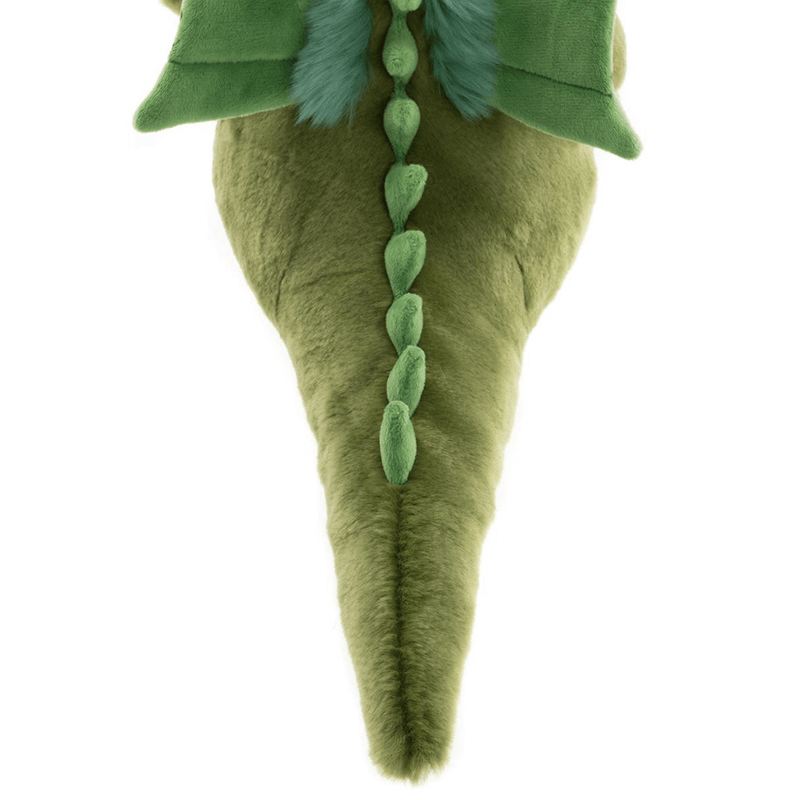 Close-up of Deck green dragon teddy from Bearhouse by Charlie Bears 2025, showing soft spine plates and tail on a white background