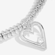 Macro view highlighting diamond detail in 16th birthday bracelet charm