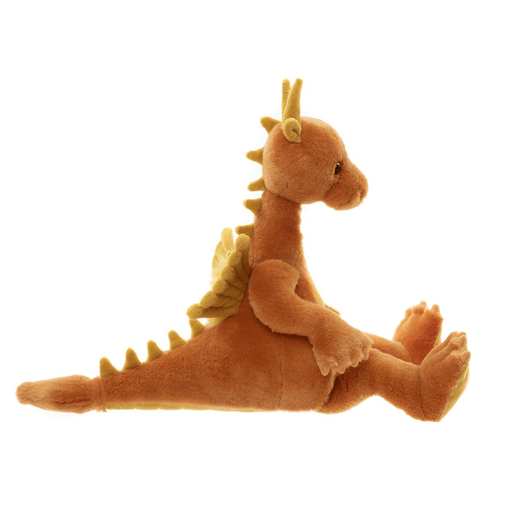 Side view of Diamonds orange dragon teddy from Bearhouse by Charlie Bears 2025 on a white background, with wings, horns and long tail