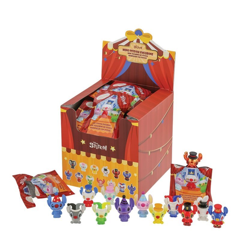 Circus-themed retail display box of Stitch blind bags with opened packs and mini figures lined up in front.


