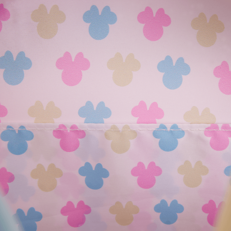 Interior lining of Minnie Loungefly Back Pack bag with pastel pink, blue and yellow Minnie icons.	