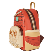 Side view of Moana Loungefly Back Pack bag showing coral panels, brown zip and tribal sash artwork.	