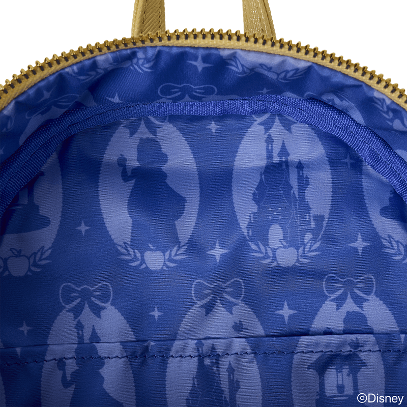 Interior lining of Snow White Loungefly Back Pack showing royal blue satin castle and apple silhouettes.	
