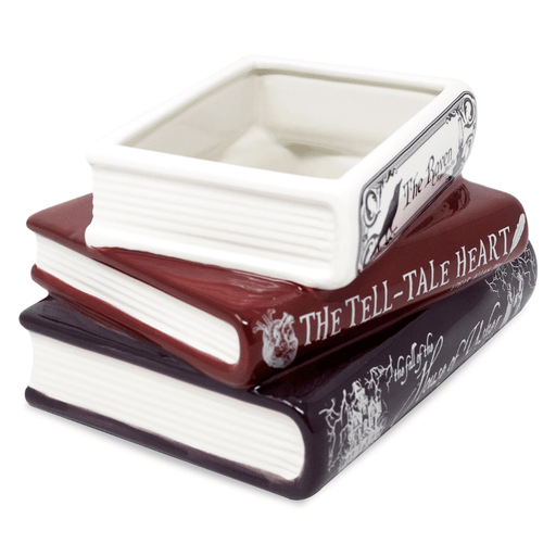 Side view of the stacked books ceramic planter with ribbed page detailing