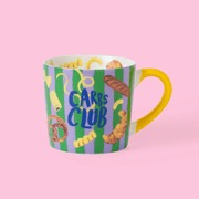 Eleanor Bowmer Carbs Club mug with green and purple stripes and yellow handle